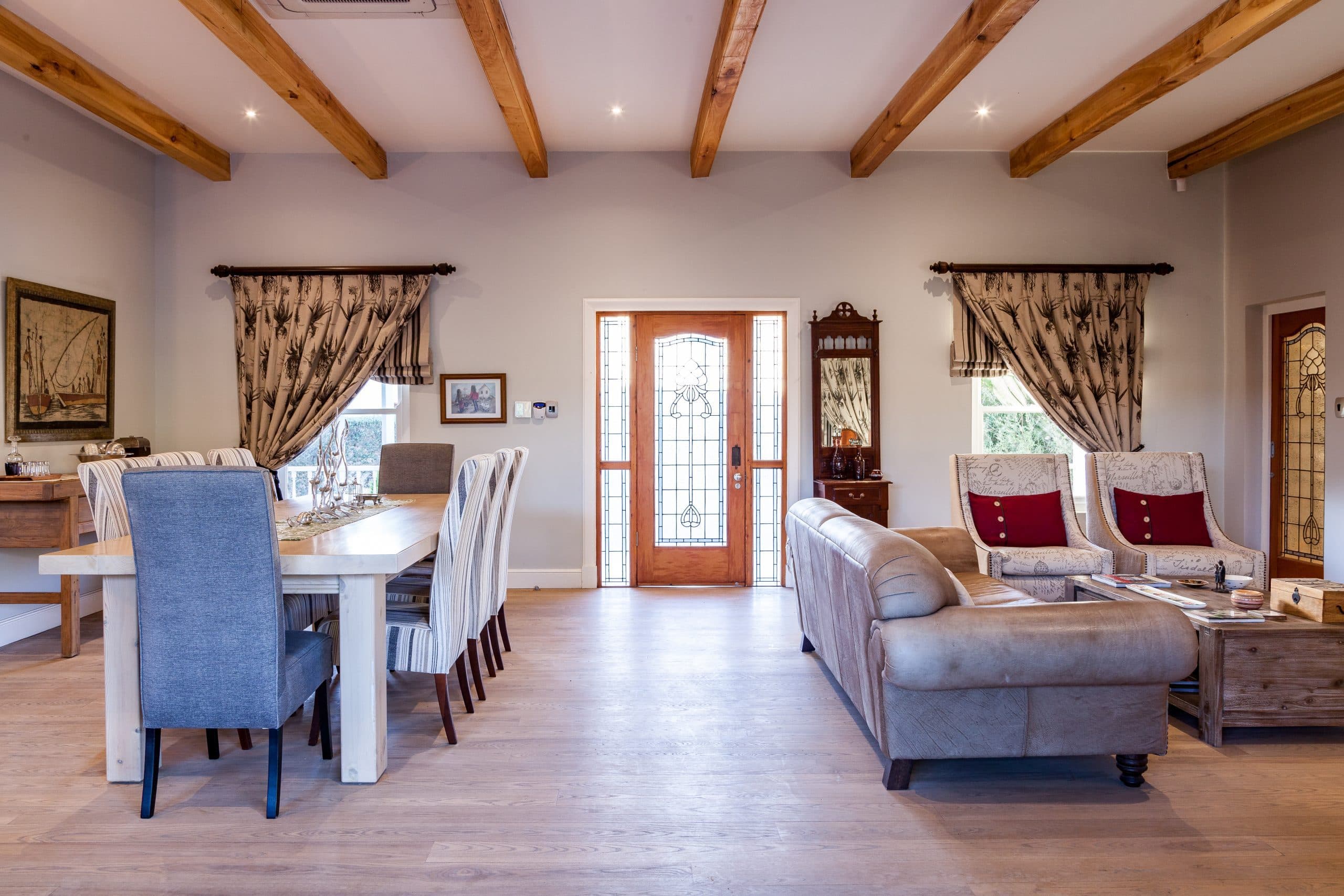Karoo View Cottages: Cottage facade at dusk, fire pit, lavender, warm-lit interior